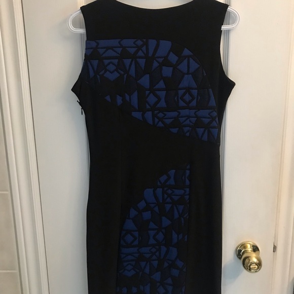 Elegant dress comes with a chic blazer like zip up jacket. - Picture 2 of 3